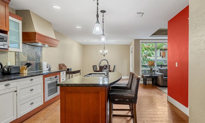 Canmore Apartment | Chic 1BR Mountain Suite | King Bed + Pool