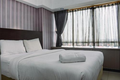 Jatinegara Apartment | Chic and Cozy 1BR Apartment at H Residence near MT Haryono By Travelio