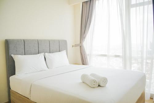 Cikini Apartment | Chic and Cozy 2BR Apartment at Menteng Park By Travelio