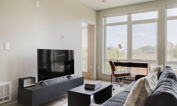 Squire Park Apartment | Chic First Hill 1BR w/Roof Lounge & Bike Storage, by Blueground