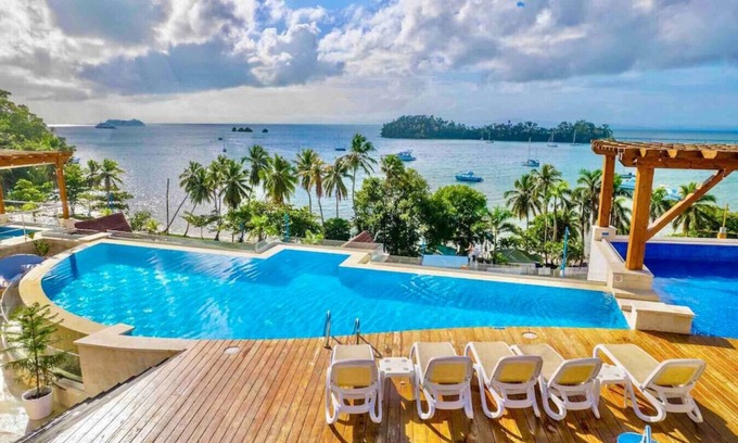 Samana Apartment | Chic Studio with King size Bed, Balcony with Spectacular Bay View, Pool, Full AC