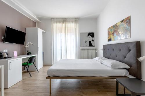 Historic Center Apartment | Cineteca Grey Studio I by Wonderful Italy