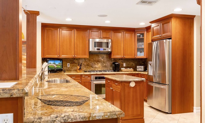Parkland House | City Oasis is a Gorgeous Home with a Pond, Pool table, Poker, and Heated Pool!