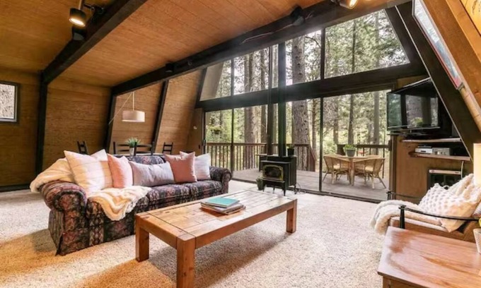 Truckee Cabin | Classic Tahoe a-frame cabin forest view floor2ceiling window. Near Northstarn