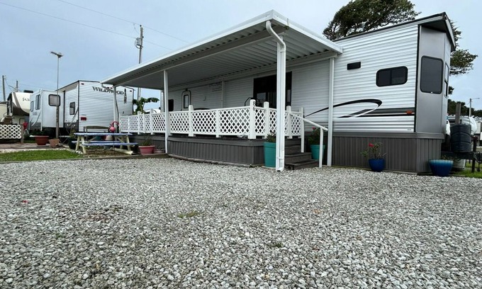 Rogers Bay House | Clean and Modern Beachside home with Partial AC and cozy patio