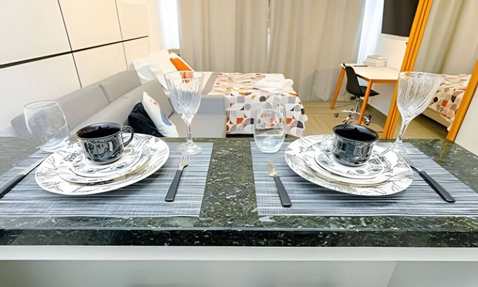 Matriz Apartment | Clean modern studio with air at Lifespace Curitiba