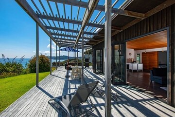 Langs Beach House | Clifftop Castle - Langs Beach Holiday Home
