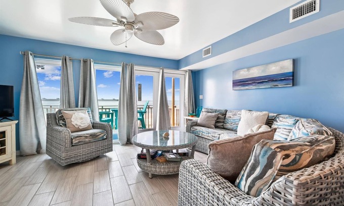 East End House | COME AND ENJOY this beautifully decorated beachfront townhome where you can soak up the sun!