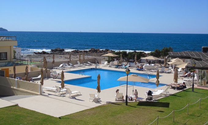 San Antonio Bay Apartment | Comfortable spacious apt with sea view and AC.