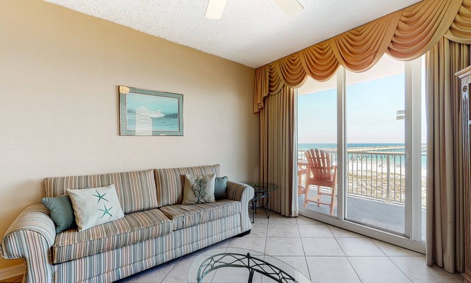 Navarre Beach Condo | Comfortable beachfront condo, beach setup included, quick drive to dining