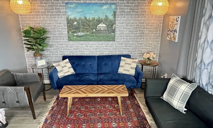 West End House | Comfy Luxe Villa Downtown with Custom Mural