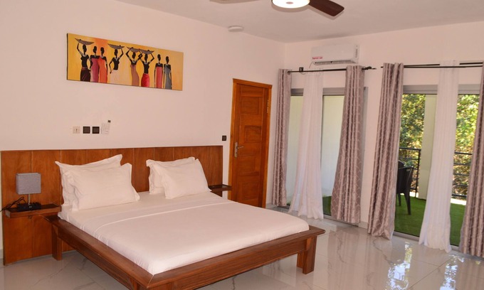 Kribi Hotel | 🛏️ 🛏️ Communicating Rooms - Lobé, Ntem, Kienje & Dja at Gîtes de Kribi