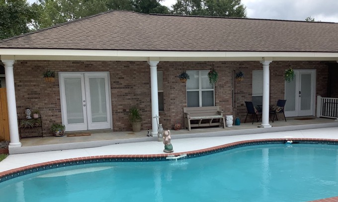 Pass Christian House | Complete, cozy apartment with laundry, pool and parking just off I-10.