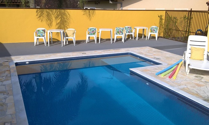 Caraguatatuba House | Cond.P. Patrimonium swimming pool, barbecue, 24h security WI-FI Air Conditioning
