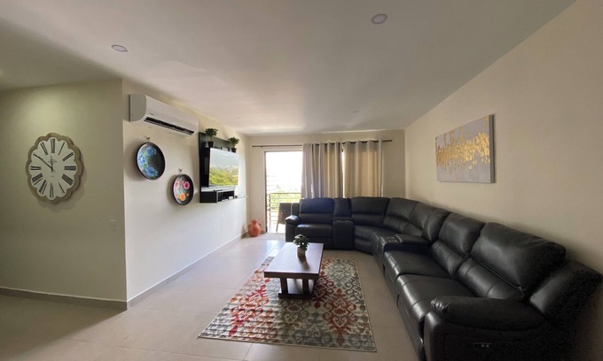 San Salvador Condo | Condo In El Salvador, with a King-size bed.