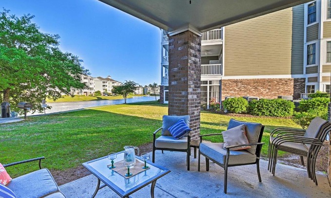 Central Myrtle Beach Apartment | Condo with Patio and Pool Access about 2 Miles to Beaches