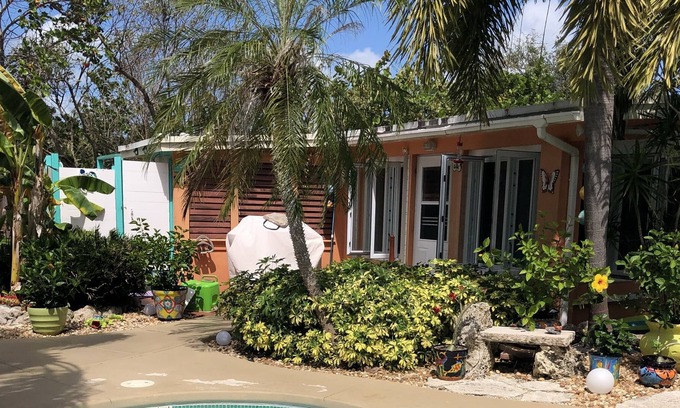 Port Pine Heights House | Coral Palms -Secluded tropical oasis pool and dock