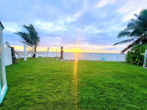 Hauula Villa | Corner Luxury Ethereal Hawaii Beachfront Estate for Monthly Rental with Private Beach & 3 Beachfront Jacuzzis & Snorkeling Reef & Jurassic Park Film Site