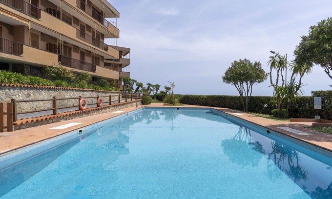 Santo Stefano al Mare Apartment | Cosy apartment for 4 guests with pool, WIFI, A/C, TV and balcony