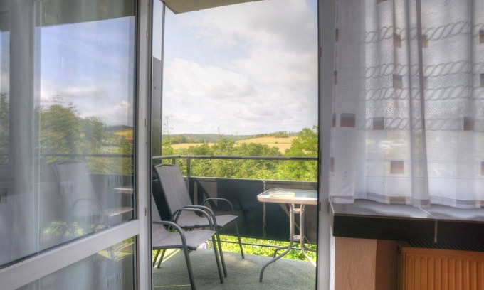 Bromskirchen Apartment | Cosy apartment for 4 people with WIFI, TV, balcony, pets allowed, panoramic view and parking