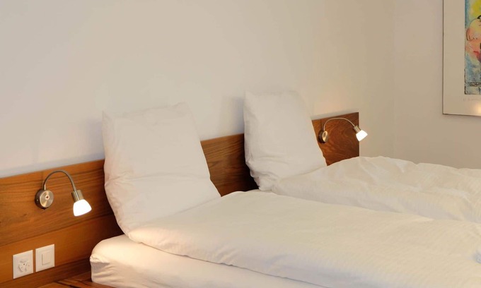 Spiez Apartment | Cosy apartment for 4 guests with WIFI, TV, balcony and pets allowed