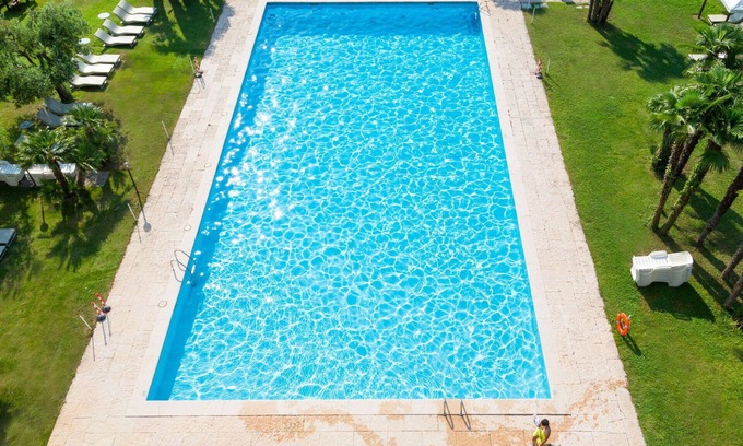 Riva del Garda Apartment | Cosy apartment for 5 people with pool, WIFI, TV and balcony