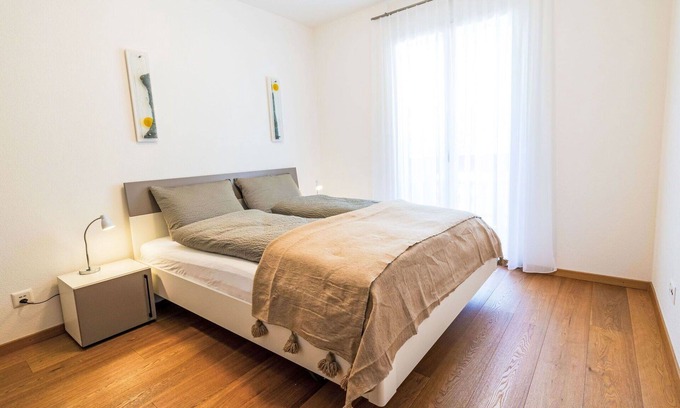 Leukerbad Apartment | Cosy apartment for 8 guests with WIFI, hot tub, TV, balcony and panoramic view