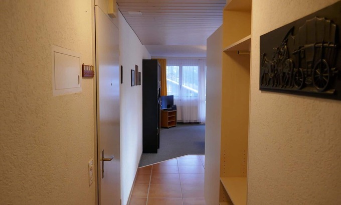 Grindelwald Apartment | Cosy apartment for 3 people with WIFI, TV, balcony, pets allowed, panoramic view and parking