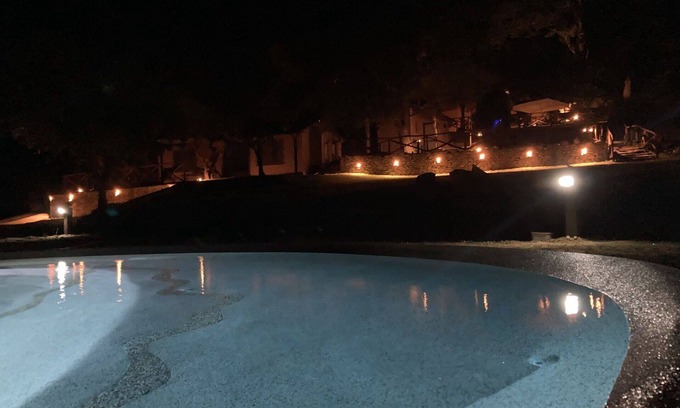 Castagneto Carducci Villa | Cosy apartment in villa for 5 guests with pool, WIFI, A/C, patio and pets allowed