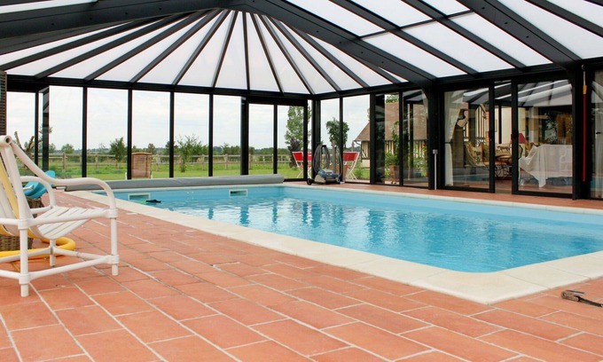 Corbon House | Cosy apartment in villa for 3 people with pool, WIFI, TV, patio and pets allowed