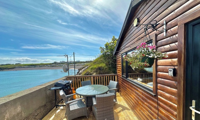 Malin Cabin | Cosy Portmor Log Cabin - Waterfront & Pet Friendly