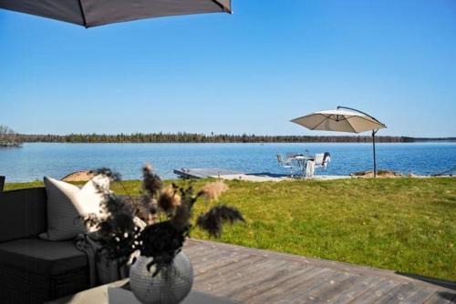 Moheda House | Cottage With Beach Plot, Boat And Jetty In Småland
