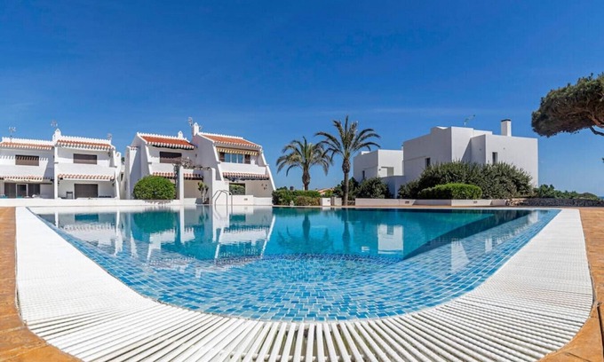 Cap d'Artrutx Condo | Cozy 2 bedroom flat with swimming pool and wifi