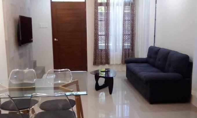 Cogon House | Cozy 3-bedroom condo with WiFi and fitness room in cool Tagbilaran City.