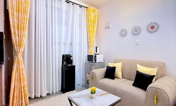 Kasarani Apartment | Cozy and elegant studio in Nairobi fully furnished with detailed interior decor.