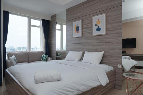 Cikini Apartment | Cozy and Tranquil Studio Menteng Park Apartment By Travelio