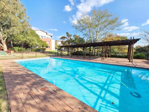Greater Johannesburg Metropolitan Area Apartment | Cozy Apartment In A 19 Hole Golf Course, Roodepoort