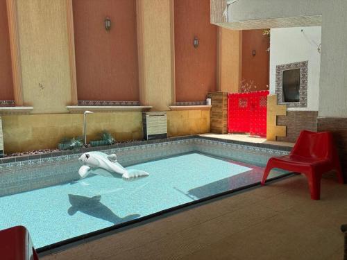 New Cairo Apartment | Cozy Apartment in front of private pool