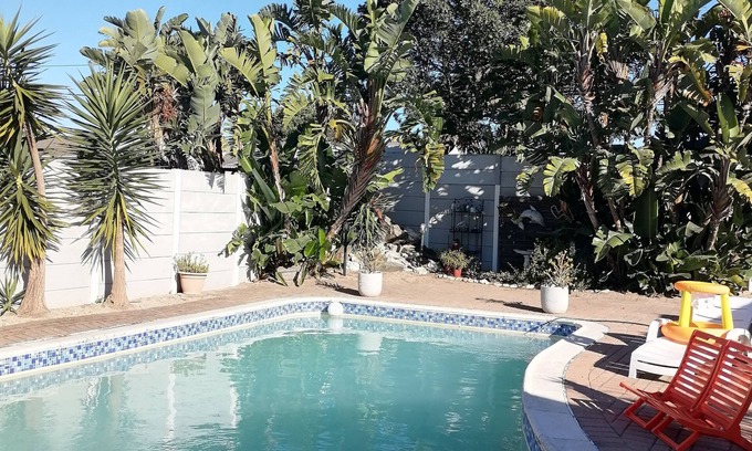 Cape Town Cottage | Cozy cottage for family getaway with private patio and pool in safe suburb.