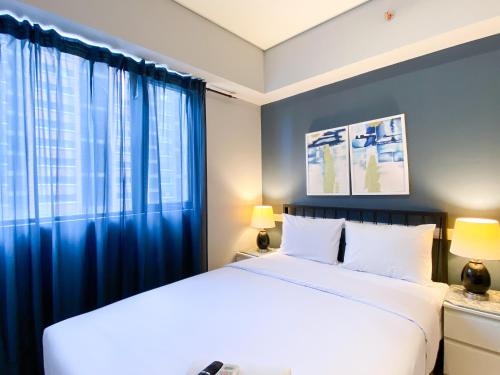 Cikarang Apartment | Cozy Designed 2BR with Working Room at Meikarta Apartment By Travelio