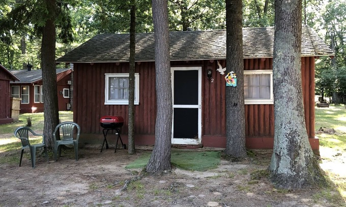 Pentwater Cabin | Cozy "Flip Flops" Cabin in the woods with Pentwater Lake frontage and access