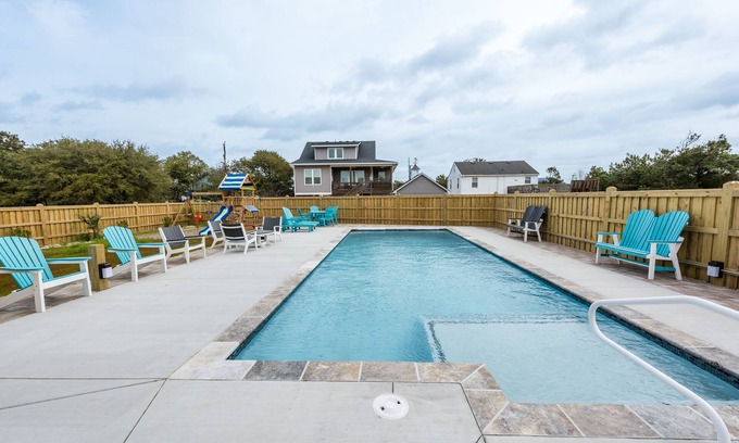 Kill Devil Hills Apartment | Cozy King Suite, POOL/GRILL/outdoor shower, coffee bar, mini fridge, microwave