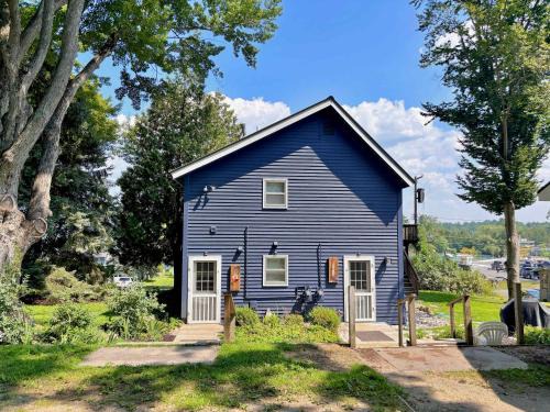 Rapid City House | Cozy Main Level Torch Lake Stay with Private Entry & Fire Pit