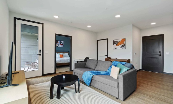 Lockerbie Square Apartment | CozySuites Mass with parking, lounge and roof deck 8