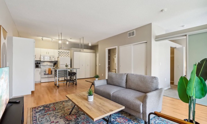 Mill District Apartment | CozySuites Mill District with pool, gym #01
