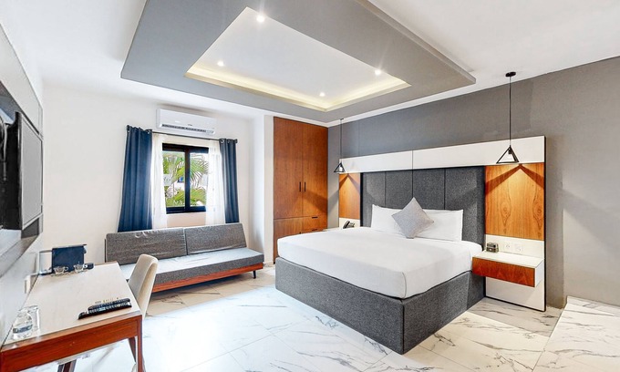 Downtown Cancun Hotel | Dazzling, centrally located apartment with luxe finishes and a shared pool