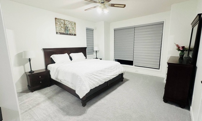 Chestermere House | Delightful ground level basement with AC in charming Chestermere