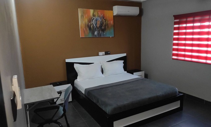 Lome House | Deluxe Double Bed in Royal Blue Guest House and Bar 02
