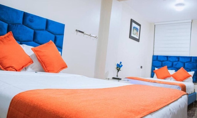 Santiago de Surco Apartment | Deluxe Queen Room with Two Queen Beds 4