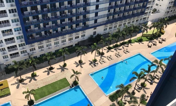 Barangay 76 Condo | Deluxe Twin Suite Bed